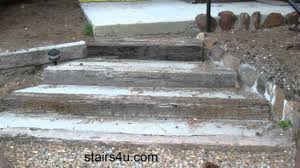 Make the area about 5 or 6 inches deeper than the railroad ties so you have room to fill the area behind the tie wall with gravel. Stairway Built With Concrete And Railroad Ties Landscaping Ideas Youtube