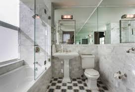 This bathroom takes it a step further by continuing a black and white striped tile pattern from the walls into the shower. Small Bathroom Ideas And Tips With Photos