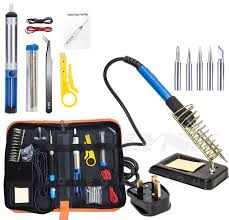 A support station, a desoldering pump, and a wire stripper. Adjustable Temperature 60w Soldering Iron Kit Electronics Welding Irons Tool
