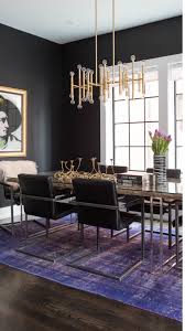 Photo of a contemporary kitchen/dining combo in melbourne with white walls, medium hardwood floors, brown floor, exposed beam, vaulted and panelled walls. Meurice Chandelier From Jonathan Adler Houzz Com Dark Dining Room Dining Room Contemporary Gold Dining Room