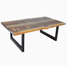 This elegant walnut slab table has a beautiful swirling grain that you will appreciate every time you use this wonderful table. Custom Made Walnut Slab With Maple Butterfly S Aurora Minimalist Coffee Table By Jonathan January Custommade Com