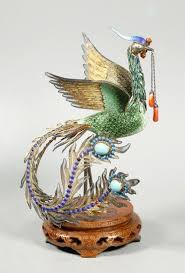Associated with the sun, a phoenix obtains new life by arising from the ashes of its predecessor. Lot Art Chinese Gilt Silver Enamel Phoenix Bird On Stand