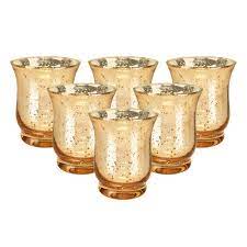 They can be purchased in bulk from many candle and craft supply stores, and these small, simple votive holders are great to add to centerpieces for extra flair. Just Artifacts Mercury Glass Hurricane Votive Candle Holder 3 5 Inch 6pcs Speckled Gold Mercury Glass Votive Tealight Candle Holders For Weddings Parties And Home Decor Buy Online In Bahamas At Bahamas Desertcart Com Productid