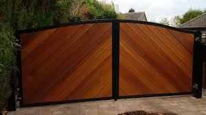 Our choice of metal gates, wooden gates, and metal railing can cater for every garden by providing a partitioning or decorative entrance. Clad Gates Shipley West Yorkshire Ase Autogate Ltd