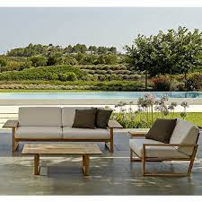 The Lineal Outdoor Sofa And Chair Collection Is Made Of Teak The Cushions Are Made With A Quick Drying Outdoor Teak Patio Table Teak Sofa Metal Patio Furniture