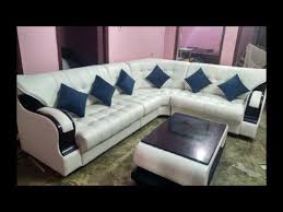 A couch, also known as a sofa or settee, is a piece of furniture for seating two or three people in the form of a bench, with armrests, which is partially or entirely upholstered, and often fitted with springs and tailored cushions. New Model Sofa Set Designs L Shape Sofa Set Designs Sofa Making From Manufacturer Furniture Couch Design Wooden Sofa Set Designs Furniture Sofa Set