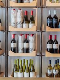 Bvs Wine Traders By Beros Abdul Architects Bracket System Wine Shelves Wine Display Wine Spirits Store