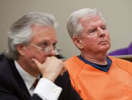 Wife stands by husband convicted in murder of couple's son-in-law