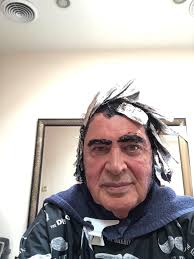 It doesn't take much! Boo! I think the first should be Engelbert  Scissorhands and the second????? I don't know about you but I look like an  old fashion mug