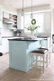 If your kitchen island isn't as large as you would like, think outside of the box. Kitchen Island Makeover Ideas Love Remodeled