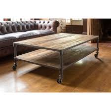 The top of the coffee table is built of salvaged wood from reclaimed shipping pallets milled into individual tongue. Reclaimed Wood Coffee Table