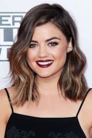 The length is between long hair and a bob cut. The Lob Haircut Summer S Hottest Haircut Budget Fashionista