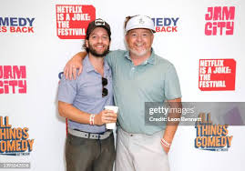 Marc Forman and Dennis Gubbins attend News Photo