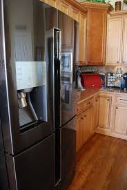 Is Black Stainless The New Black A Samsung Review Samsung Black Stainless Refrigerator Black Stainless Steel Kitchen Black Refrigerator