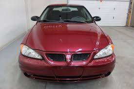 Image result for Red Brown 2004 Pontiac