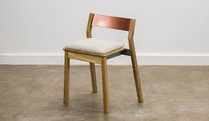 The Stout Chair By Henry Lin Of Toronto S This Or That Studio Features A Low Copper Plate Backrest And A Walnut Or Whi Dining Chairs Furniture Collection Chair