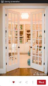 Framed glass walls create visual connection even as drapes offer privacy when needed. Is It Crazy To Install French Glass Doors Leading To A Guest Bedroom