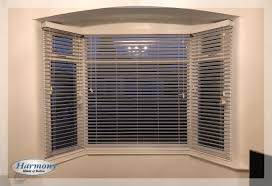 Shutters are a common window treatment, too. Bay Window Blinds Ideas