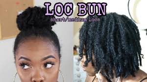 Curled ends are achieved by attaching (braiding in) curly pieces of synthetic hair to the roots of your natural hair. Messy Loc Bun On Short Medium Locs Youtube