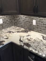 Black And White Quartz Slab Grey Cabinets Grey Glass Subway Tiles Quartz Splendor White Granite I Love Kitchen Remodel Countertops Granite Countertops Kitchen Dark Granite Countertops
