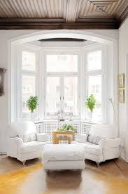 Amazing gallery of interior design and decorating ideas of bay window in bedrooms, living rooms, dens/libraries/offices, dining stunning bay window with a black dresser centered at windows with an arched finish and styled decor. 50 Cool Bay Window Decorating Ideas Shelterness