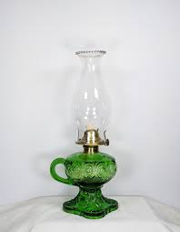 antique green oil lamp oil lantern kerosene canadian bullseye safety handle finger oil lamp made by diamond glass co montreal 1890 1902 oil lamps oil lantern lamp