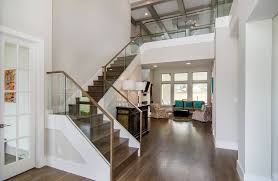 The glass will rest on the bumpers. Glass And Wood Railings Houzz
