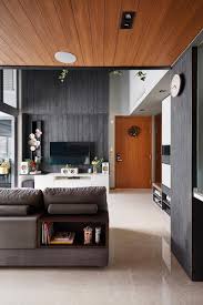 This Family S Mod Industrial Home Has Its Own Mezzanine Loft Feature Wall Living Room Industrial House Interior Design