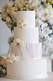 This frosting layer helps the fondant stick to the cake and smooths out any bumps or imperfections on the. 20 Ways To Decorate Your Wedding Cake With Fresh Flowers
