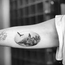This tattoo, done at tattoo crew london, isn't something that everyone might notice. Fine Line Hamburg Tattoos Hogwarts Tattoo By Mark Ostein