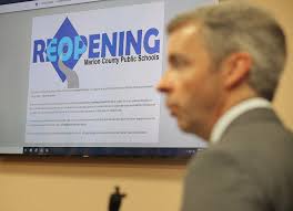 Schools face 'significant challenges' as board votes to re-open