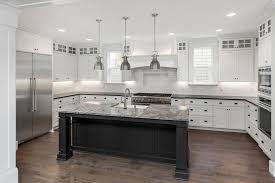 These 30 modern kitchen designs use a mix of materials and. Quartz Vs Granite Stainless Vs Black Which Kitchen Styles Will Dominate This Year The Seattle Times