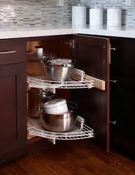 8 Ingenious Organizing Ideas For Corner Cabinets Corner Kitchen Cabinet Kitchen Cabinet Storage Small Kitchen Storage