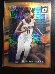 2017 18 Donruss Optic 93 Jrue Holiday Orange Prizm Basketball Card 157 199 Neworleanspelicans Basketball Cards Basketball New Orleans Pelicans