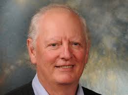 Book examines Father Greg's community development work