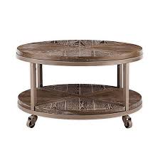It offers an abstract, yet streamlined shape in a walnut hue that's the perfect perch for freshly made martinis, delicious appetizers, or as a fun space for your. Southern Enterprises C Konya Round Wood Cocktail Table Bed Bath And Beyond Canada