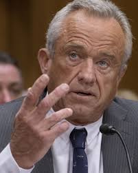 State police are asking for the public's help in learning more about the  driver of a black motorcycle who's accused of shooting at a vehicle