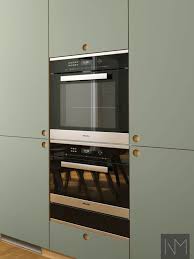 To keep the groovy vibes going with the cabinets, the designers opted for a muddy green color with hints of brown undertones. Linoleum Circle Practical Kitchen Fronts Noremax