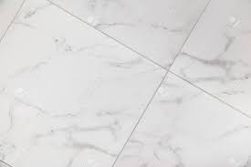 Replacing old flooring with tiles is a task that can add value and beauty to a house. Ceramic Tile Background With Marble Texture Diagonal Layout Stock Photo Picture And Royalty Free Image Image 135582325