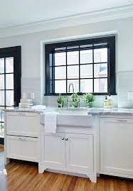 3 Reasons To Paint Window Trim Black Emily A Clark Black Window Trims Black Wall Decor Kitchen Design