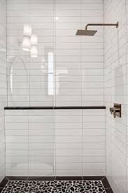 For a superior install, we used a in this video i show you how to install and grout a 4x16 subway tile on a kitchen backsplash and run it this video shares tips for how to tile a shower wall using subway tile. Shower Tile 4x16 White Subway Tile In A Horizontal Stack Pattern And River Rock For Shower White Subway Tile Shower Bathroom Shower Tile Bathroom Shower Design