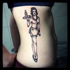 This is a beautiful range of realistic traditional & vintage designs. Nice Club Pin Up Girl Tattoo On Side Rib For Girls