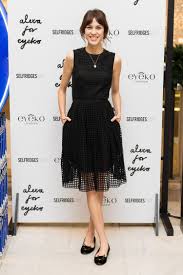 Alexa Chung Wears Her Lbd And Cute Flat Shoes For An Adorable Party Look Carven Dress Alexa Chung Style Little Black Dress
