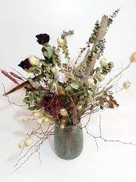 Dried flowers have a timeless quality that have an inherent longevity and permanence to them. Hannah Gorgeous Dried Flowers In A Retro Glass Vase Victoria Florists