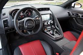 Separated by a more aggressive rear venturi, they are an unmistakable symbol of power. 2015 Jaguar F Type R Coupe Driven Top Speed