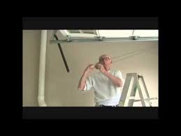 Replacing Garage Door Extension Spring Safety Cable Garage Door Extension Springs Diy Garage Door Garage Doors