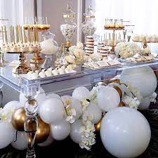 Think a tiffany blue box birthday cake, light blue balloons, streamers and the birthday girls very own logo. Luxurious White And Gold Dessert Table Gold Dessert Table Wedding Candy Table Wedding Dessert Table