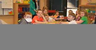 Mack's back: After 14-month fight with cancer Hawkins 1st-grader returns to  school