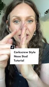 Replying to @Angela #nosepiercing, #nosestud, #corkscrewnosestud,  #piercingtutorial, #nosepiercingtutorial, #bodymodifications,  #jewelrytutorial, #DIYjewelry, #beautyhacks, #tiktoktutorial