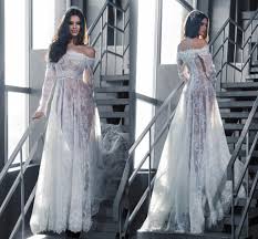 Exotische blumenmuster wecken unsere romantische seite und passen einfach hervorragend zu heißen jahreszeit. Grosshandel Hot Sexy Exotische A Linie Brautkleider Bateau Hals Weg Von Der Schulter Langen Armeln Brautkleider Durchsichtig Spitze Tull Braut Kleider Gewohnheit Von Weddingdressesonline 111 11 Auf De Dhgate Com Dhgate